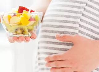 Une femme enceinte. 